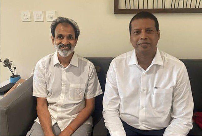 Dr. Harish K. V with Raghavendra Rajkumar